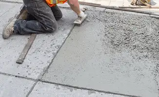 Professional repairing a concrete floor in San Diego, CA