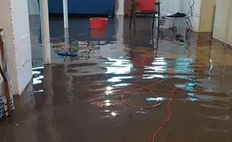 Basement with boiler, cabinets and washing machine completely flooded in San Diego, CA